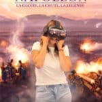 Napoléon movie poster: a person wearing a VR headset stands in a smoke-filled battlefield, with the title Napoléon and the tagline 'La gloire, la chute, la légende' above.