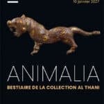 Poster for ANIMALIA exhibition at Hôtel de la Marine, featuring a carved animal figure on a dark background.